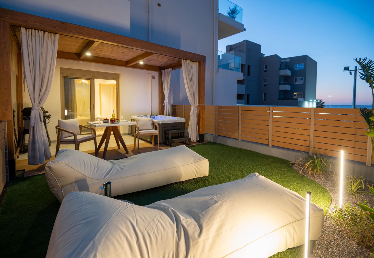 Apartment in Rethymno Town - 1-Bedroom Beachfront Urban Retreat with Outdoor Hot Tub